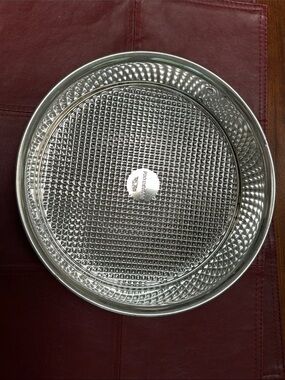 Springform pan (cheesecakes?)Textured Metal Baking Pan - Silver, 9.5” diameter.